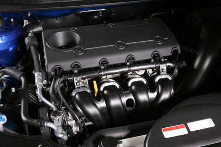 four cylinder engine of the new car close upの写真素材