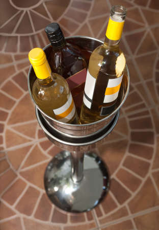 bottles with wine bucket for iceの写真素材