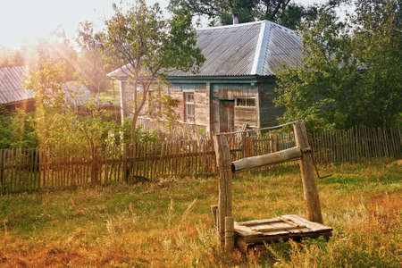 wooden house with garden in the Russian villageの写真素材