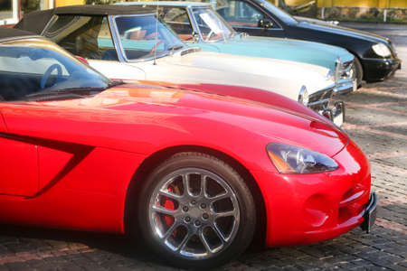 color cars on parking in row outside