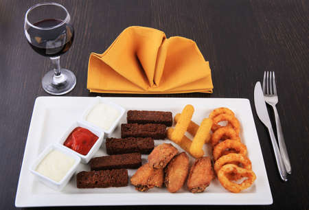 chicken nuggets with sauce on plateの写真素材