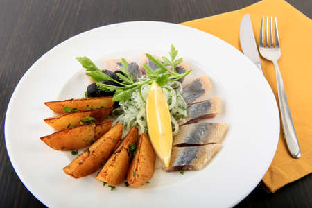 herring with potatoes and onionsの写真素材