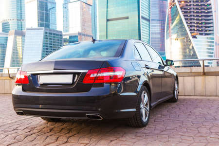 black car against the Moscow business centerの写真素材
