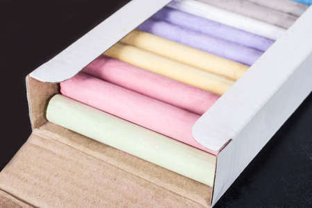 round round color pieces of chalk in cardboard boxin の写真素材