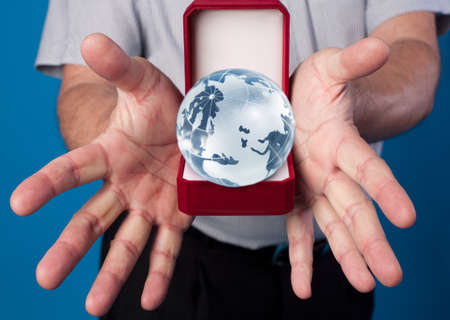 red box with the globe in man's hands