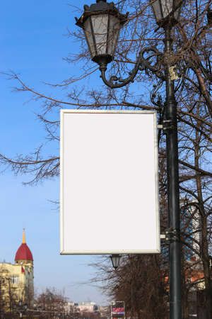 vertical banner on lamppost in the downtownの写真素材