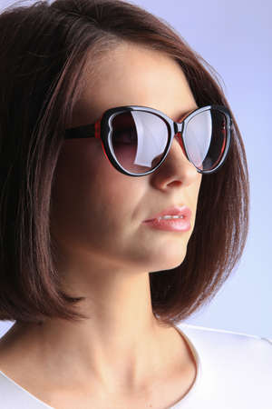 portrait of the beautiful girl in sunglassesの写真素材