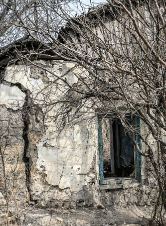wall with window of the old destroyed houseの写真素材