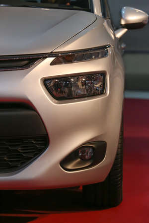 modern silvery car at an exhibition close upの写真素材