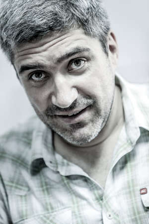 portrait of the brutal man close up