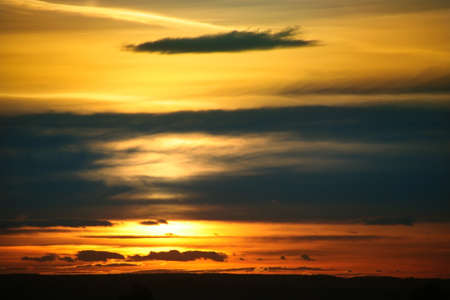 magnificent sky of decline with layered cloudsの写真素材