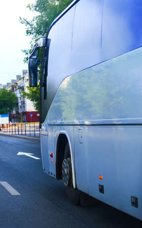 big bus goes on the city streetの写真素材