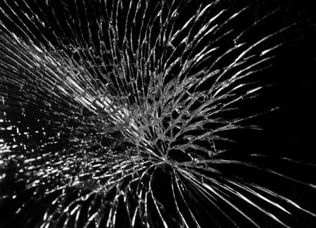 cracks on windshield on black backgroundの写真素材