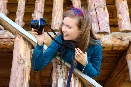 beautiful girl with camera photographs sightsの写真素材