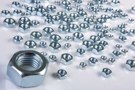 metal shine nuts on white backgroundの写真素材