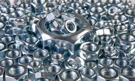 metal shine nuts on white backgroundの写真素材