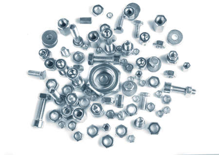 chromeplated bolts and nuts on white backgroundの写真素材