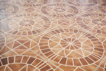 ceramic tile with geometrical drawing on floorの写真素材