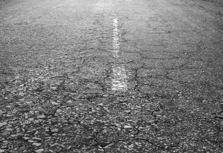 middle of old asphalted highway close up