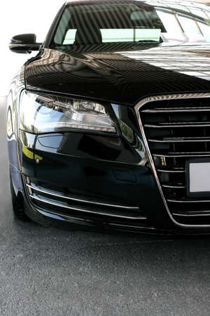 beautiful black modern car close upの写真素材