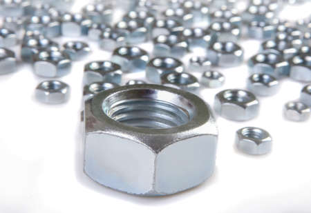 metal shine nuts on white backgroundの写真素材