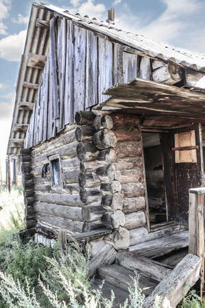 old log thrown rural hutの写真素材