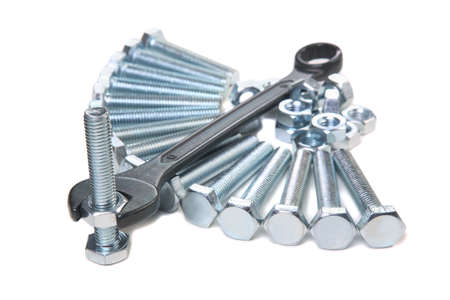 wrenches bolts and nuts on white backgroundの写真素材