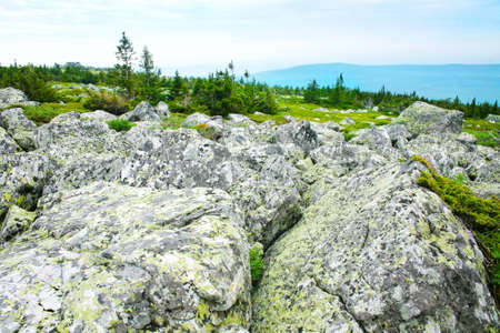 stone boulders before wild landscapeの写真素材