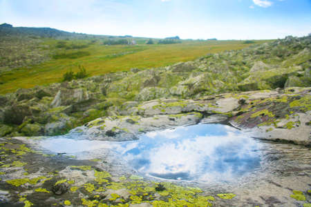 landscape with pool in stone deepening after rainの写真素材
