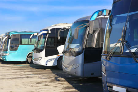 big tourist buses on parkingの写真素材