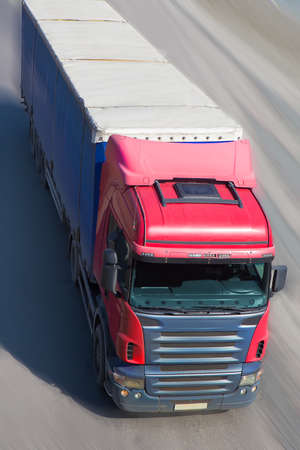big powerful truck moves on highwayの写真素材