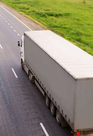 truck transports freight on  country highwayの写真素材