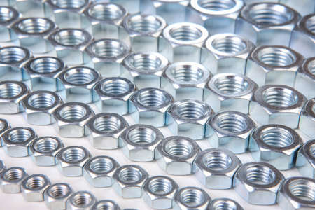 metal shine nuts on white backgroundの写真素材