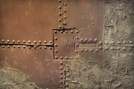 old metal surface with rivetsの写真素材