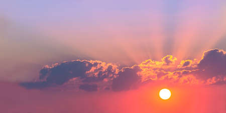 beautiful bright sunset in cloudy skyの写真素材