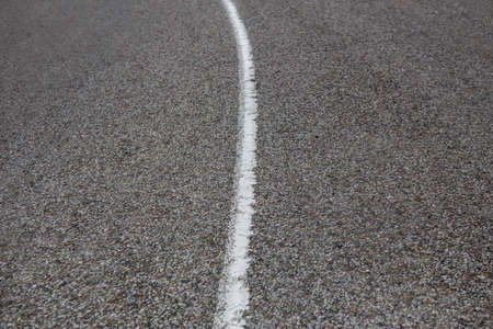 asphalt paving on highway turn close upの写真素材