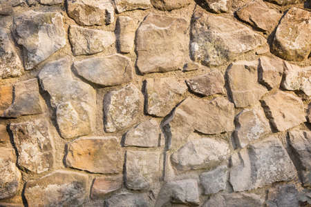 masonry stone wall rock construction patternの写真素材