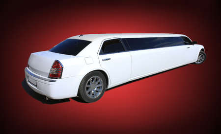 big white limousine on red black gradient backgroundの写真素材