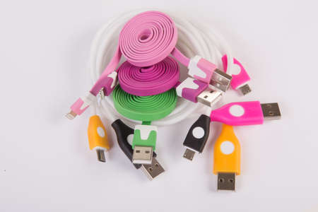 color wires with plugs on white backgroundの写真素材