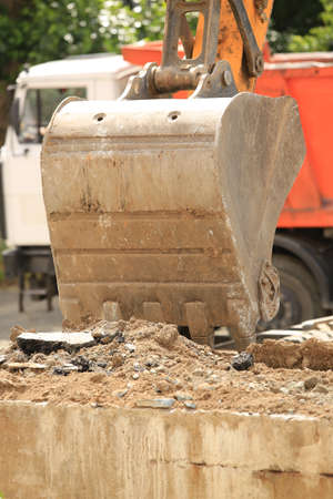 dredge earth loading in the dump truck