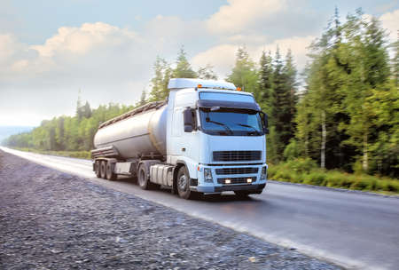 big gas-tank truck goes on highway