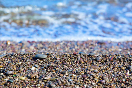 smooth pebble under water on the river bankの写真素材