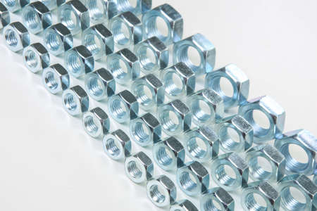 metal shine nuts on white backgroundの写真素材