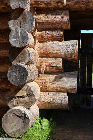 wooden log house closeup partの写真素材