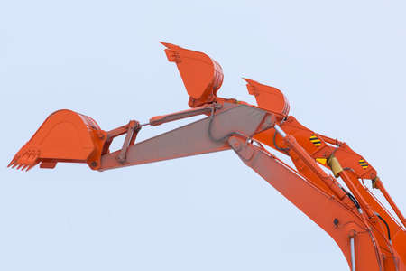 ladles of dredges against blue skyの写真素材