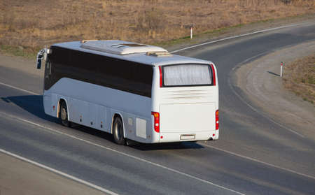 bus goes on the country highwayの写真素材
