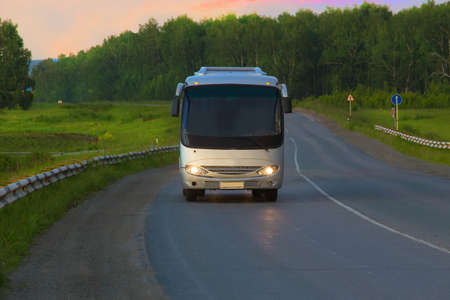 bus goes on the country highwayの写真素材