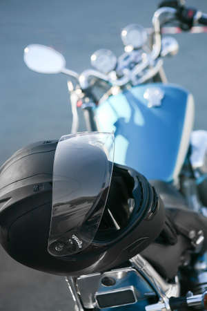 big powerful motorcycle is parked on asphalted roadの写真素材