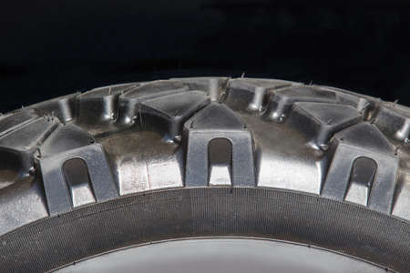 truck wheel texture closeup isolated on black