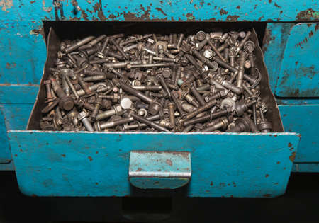 bolts screws dirt closeup backgroundの写真素材